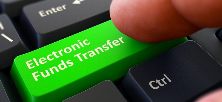 finger-on green-electronic-funds-transfer-button-using-real-time-bank-transfers.jpeg